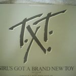 T.X.T. - Girl's Got A Brand New Toy (12", Promo, Whi)