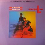 Strange Love - Plug It In (Long Version) (12", Sup)