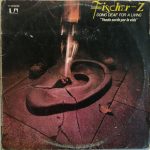 Fischer-Z - Going Deaf For A Living = Yendo Sordo Por La Vida (LP, Album)
