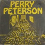 Perry Peterson (2) - (At The) Dark End Of The Street (7", Single)