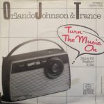 Orlando Johnson & Trance - Turn The Music On (7", Single)