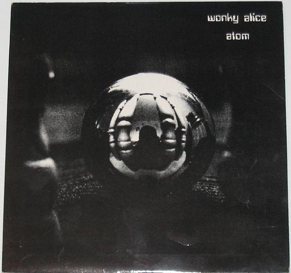 Wonky Alice - Atom (7", Single)