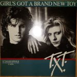 T.X.T. - Girl's Got A Brand New Toy (Extraordinary D.J.-Mix) (12", Maxi, RP, Red)