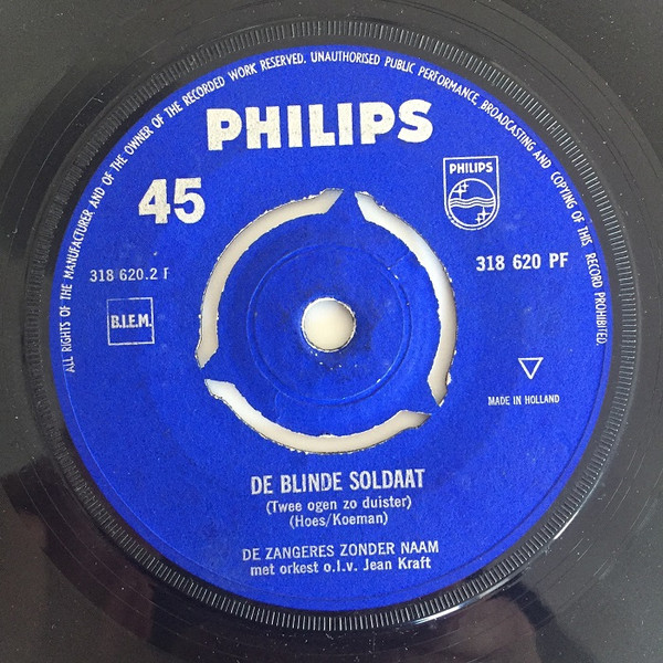 De Zangeres Zonder Naam*-1