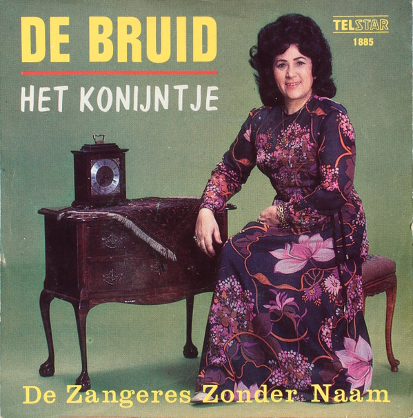 De Zangeres Zonder Naam*-1